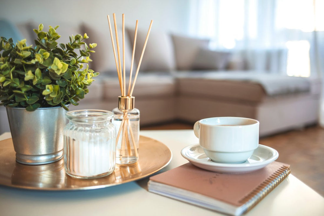 Scandinavian home with decor candles, reed diffusers, books