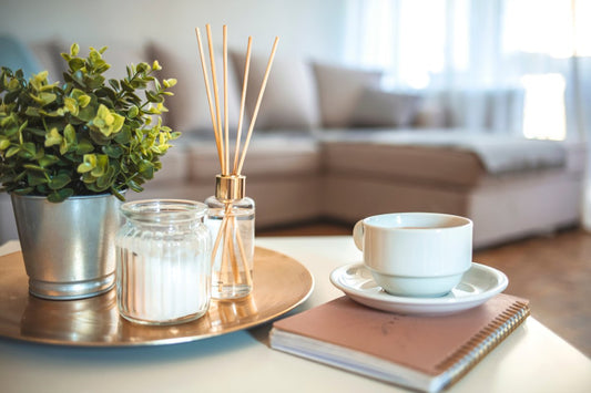 Scandinavian home with decor candles, reed diffusers, books